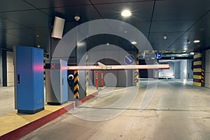 Barrier at entrance to underground parking garage