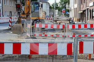 Barrier with excavator