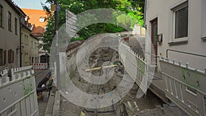 Barrier fencing of a construction site with red and white markings in Freising, Bavaria, Germany. Fencing during