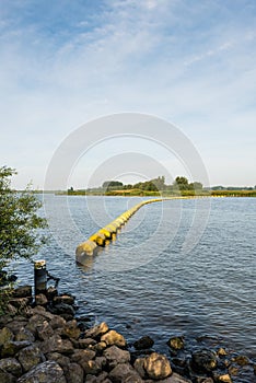 Barrier of floating switched yellow objects