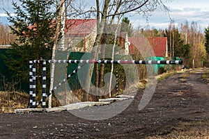 Barrier on a gravel street.