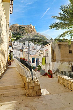 Barrio Santa Cruz with Santa Barbara castle on Benacantil mountain in Alicante, Spain photo