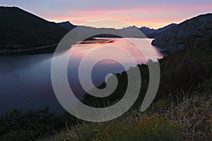 Barrios de Luna reservoir in summer evening photo