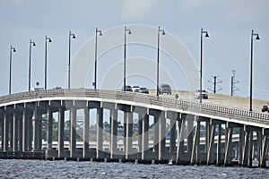 Barron Collier Bridge and Gilchrist Bridge in Florida with moving traffic. Transportation infrastructure in Charlotte