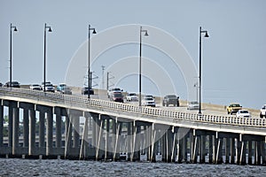 Barron Collier Bridge and Gilchrist Bridge in Florida with moving traffic. Transportation infrastructure in Charlotte