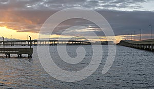 Barron Collier Bridge and Gilchrist Bridge in Florida with moving traffic. Transportation infrastructure in Charlotte