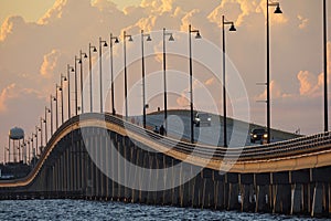 Barron Collier Bridge and Gilchrist Bridge in Florida with moving traffic. Transportation infrastructure in Charlotte