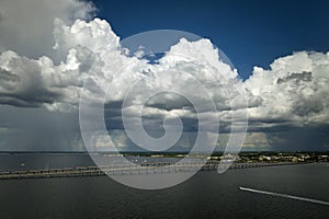 Barron Collier Bridge and Gilchrist Bridge in Florida with moving traffic. Transportation infrastructure in Charlotte