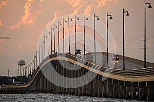 Barron Collier Bridge and Gilchrist Bridge in Florida with moving traffic. Transportation infrastructure in Charlotte