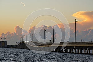 Barron Collier Bridge and Gilchrist Bridge in Florida with moving traffic. Transportation infrastructure in Charlotte