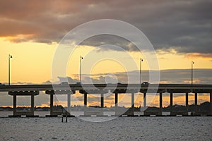 Barron Collier Bridge and Gilchrist Bridge in Florida with moving traffic. Transportation infrastructure in Charlotte