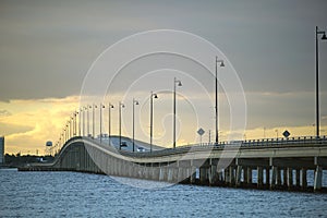 Barron Collier Bridge and Gilchrist Bridge in Florida with moving traffic. Transportation infrastructure in Charlotte