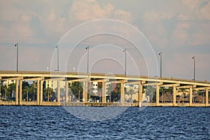 Barron Collier Bridge and Gilchrist Bridge in Florida with moving traffic. Transportation infrastructure in Charlotte