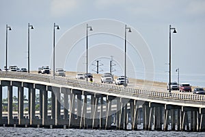 Barron Collier Bridge and Gilchrist Bridge in Florida with moving traffic. Transportation infrastructure in Charlotte