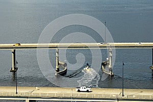 Barron Collier Bridge and Gilchrist Bridge in Florida with moving traffic. Transportation infrastructure in Charlotte