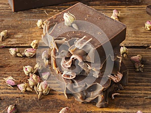 Bars of homemade chocolate and rose soap