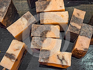 Bars of soap on a shop window. Tar soap with natural cedar oil, turpentine and herbal ingredients. Handmade natural cold process