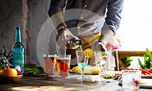 Bartender guy working prepare cocktail skills photo
