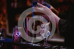 The bartender makes cocktail `blue lagoon` 02