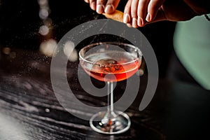 Bartender making relaxing cocktail at the bar background no face