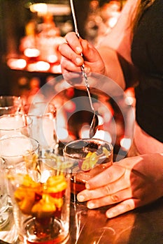 Bartender Mixing Cocktails at a Restaurant