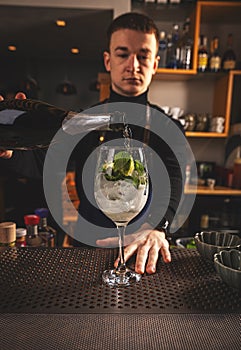 Bartender pouring champagne