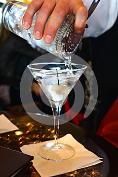 Bartender Pours Martini Cocktail Drink Vertical