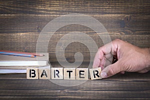 Barter concept. Wooden letters on the office desk