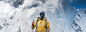 Barve solo hiker walking across high altitude mountain track. Traveler with backpack and trekking poles climb up to mountains rock