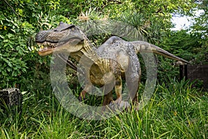 Baryonyx standing in tall grass display model in Perth Zoo