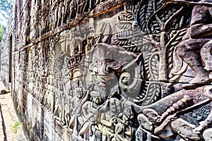 Bas relief at ancient Bayon temple in Angkor Thom, Siem Reap, Ca