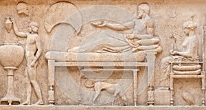 Bas-relief on ancient Thasos funerary stele, Greece photo