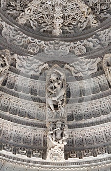 Bas-relief with dancing Apsara at famous ancient Ranakpur Jain temple in Rajasthan state, India