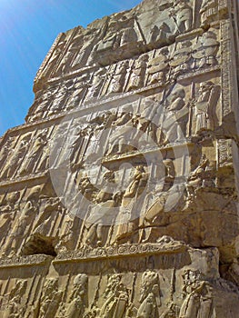 Bas-relief depicts guards - warriors of king. Ancient relief on the wall of the ruined city of Persepolis. Iran