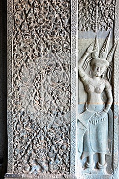 Bas relief details of Angkor wat temple in Cambodia