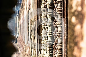 Bas relief details of Angkor wat temple in Cambodia