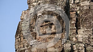 Bas-relief of the face in Bayon - ancient Khmer temple in Angkor Thom temple complex, Cambodia