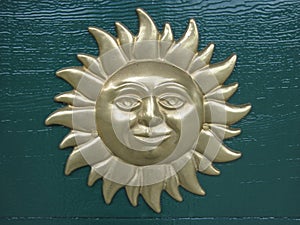 The bas-relief Face of the Sun is hinging on the door