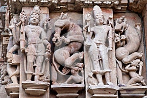 Bas-relief at famous ancient temple in Khajuraho, India