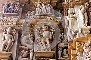 Bas-relief at famous ancient temple in Khajuraho, India