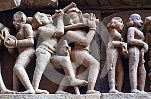 Bas-relief at famous ancient temple in Khajuraho, India