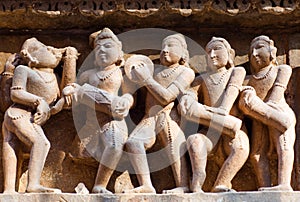 Bas-relief at famous Hindu temple in Khajuraho, India