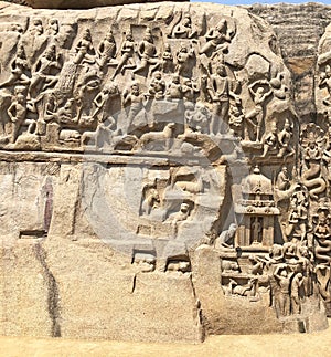 Bas relief rock cut sculptures of Gods, people and animals carved in monolithic rock 