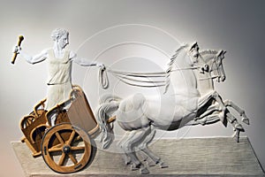 Bas-relief of a Roman Centurion driving a chariot photo