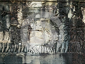 Bas relief sculpture on Bayon temple in Angkor, Cambodia