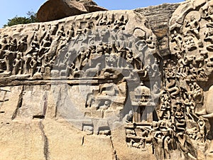 Bas relief rock cut sculptures of Gods, people and animals carved in monolithic rock