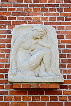 Bas-relief The squating girl (Genius), a close up. Kaliningrad