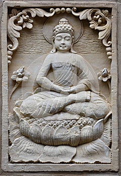 Bas-relief stone sculpture of Buddha