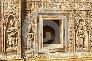 Bas-relief on stone, Ta Prohm temple, Angkor Thom, Siem Reap, Cambodia.