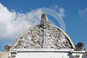 Bas relief at top of the sumur gumantung, the underground stepway tunnel at taman sari water castle - the royal garden of